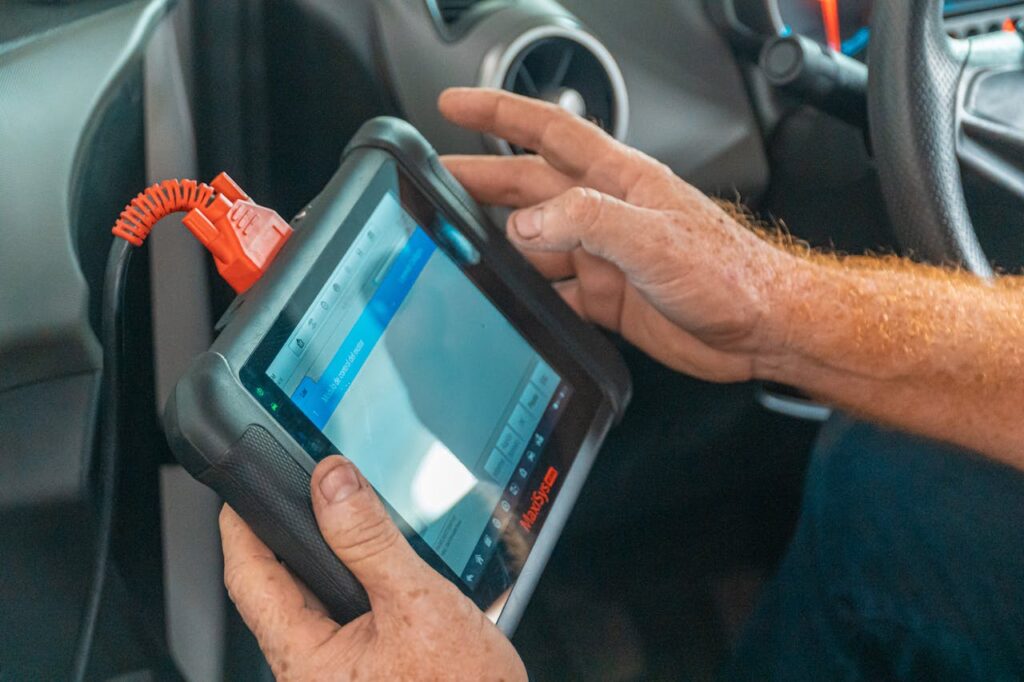 close-up-of-mechanic-with-tablet-4116198 Close up of Mechanic with Tablet